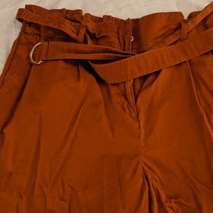 Rust coloured paper bag pants